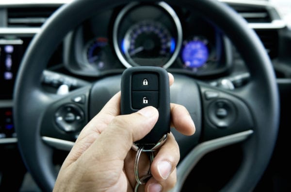 Vehicle key being used inside a car